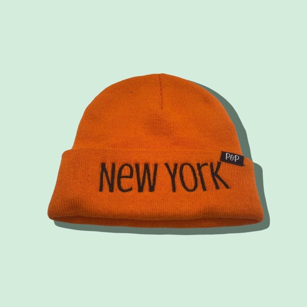 COPY - New York winter cap in a super cute orange color.
